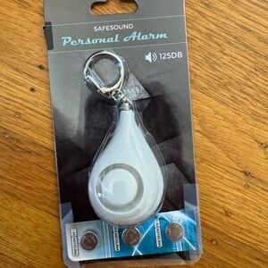 NWT Safesound personal alarm with batteries